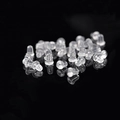 Clear silicone earring backs for studs on a reflective black surface accessory set - Plastic Bullet Style / Transparent (100 Pcs)