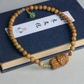Bulnesia sarmientoi wooden double-loop bracelet with carved Buddha pendant and natural beads - 8mm Round Beads Double Loop + Tara Pendant