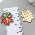 Christmas snowflake alloy pendant with red and green enamel and golden bow detail - Snowflake (22x17mm)