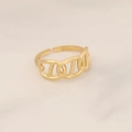 Detail of adjustable gold geometric stainless steel ring with turquoise setting on beige - Geometric Hollow Style (5#)