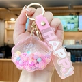 Llavero de concha rosa con cuentas de colores y colgante de silicona con Happy - Rosa