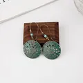 Bohemian tribal dangle earrings in bronze green with ethnic hollow pattern and beads - Bronze Hollow Pattern (H1694)