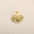 Macro detail of a 14k gold plated shell pendant with sparkling cubic zirconia stones - A0782 Square Zirconia Shell