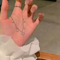 Elegante bracciale in argento con ciondoli a luna stella e cuore alato sul polso donna - Argento (Stella Luna Perla)