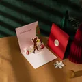 3D pink Christmas card with reindeer design, red envelope, and golden seal sticker - Style B-Fairy Tale Xmas (Girl/Reindeer)