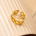Minimalist gold titanium steel open ring with hollow heart pattern on ceramic surface - Hollow Heart