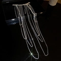 Macro shot of silver rhinestone body chain with layered tassels on black jewelry box - Silver (1# Body Chain)