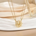 Detail view of a gold-plated double-layer necklace with micro-set zircon moon pendant - Gold Double Layer Star Moon Winged XL0480