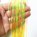 Iridescent tinsel foil fringe curtain for party decoration held by hand - 6cm x 1m / Candy Yellow