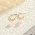 Elegant gold C-shaped earrings with natural pink raw stone pendants on white background - Pink Style (YLEH-0156-Pink)