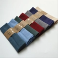 Macro detail of multicolored linen waffle napkins arranged diagonally on a white background - Napkin 7-Piece Set / 30*40cm