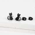 Macro detail of minimalist black cat stud earrings in matte stainless steel finish - Cat 2 / Black