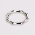 Close-up of a minimalist silver stainless steel ring with a bamboo joint design - US 6 / Steel