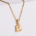 Detail view of gold-plated capital letter E pendant necklace with minimalist O-chain - Letter E