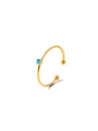 Detail of gold stainless steel nose ring featuring a round cyan zircon stone - Lake Blue
