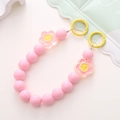 Pink acrylic bead phone strap with yellow smiley face flower charms and gold clips - Sunflower Hand Chain Style (K948)