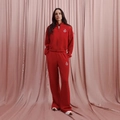 Tuta sportiva rossa a due pezzi con giacca a zip e pantaloni larghi con logo bianco - S / Rosso