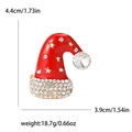Spilla cappello di Natale scintillante con smalto rosso e strass su sfondo bianco - Rosso