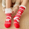 Red Christmas themed sherpa lined socks with white snowflake patterns and non-slip soles - Bright Red Snowflake