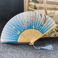 Blue gradient folding fan with flower butterfly pattern and decorative blue tassel - Classic Butterfly Flower - Sky Blue