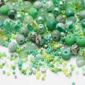 Mix of green and white glass beads in various shapes and sizes for DIY jewelry making - Light Green Series