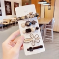 Detail showing 5-piece hair clip set with pearls, bear, rose motifs and Loveme text - Bear Hair Clip 5-Piece Set