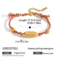 Dettaglio del bracciale intrecciato impermeabile rosso e rosa con ciondolo Lucky in acciaio - Acciaio inossidabile/Corda di cotone / Stile Intrecciato Stella Fortunata Rosso Rosa Oro (JDB0207001)