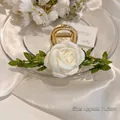 Floral hair claw clip with white silk roses and green leaves in golden metal finish - Flower Vine Claw Camellia