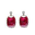 Detailed view of luxury ruby red gemstone earrings with sparkling crystal accents - Red Rhinestone Ear Studs (Pair)