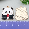 DIY cartoon panda with red apple enamel alloy pendant featuring a golden back and ruler - Shy Panda Holding Apple