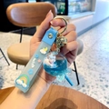 Blue unicorn milk tea liquid keychain with floating cat and rainbow wish strap - Blue-Lollipop Unicorn