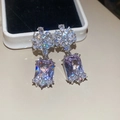 Close-up of elegant floral silver earrings with sparkling lavender rectangular stones - 37# Light Purple Flower Butterfly Dangle (Silver Post)