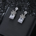 Silver flower drop earrings with rectangular zircon crystals on black leather base - White Zircon Palladium White Plated