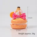Porte-clés macaron orange miniature avec nœud rose et crème, hauteur 5,5 cm - Orange avec dragonne de téléphone rose
