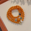 Bohemian multi-layer orange agate bracelet featuring dZi bead and turquoise accents - Three Circles Imitation Amber: Dzi Bracelet