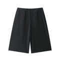 High-waisted black wide-leg shorts for women with side pockets on white background - S / Black