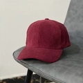 Close-up of burgundy corduroy baseball cap texture on a gray leather background - M (56-58cm) / Burgundy