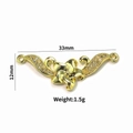 Detail view of 18k gold plated leaf pendant with zircons, size 33mm by 12mm - Style 1-Flower Wing