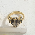 Adjustable gold ring featuring geometric blue and white zircon stone patterns - Blue Zircon Pixel Robot