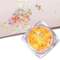 Sparkling orange glitter gel for makeup and nails featuring stars and hexagon shapes - Iridescent Orange
