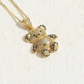 Collana con ciondolo a forma di orso dorato con zirconi bianchi e blu su catena sottile - Zircone Blu Reale