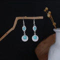 Bohemian silver drop earrings with turquoise stones on a rustic wood branch display - Turquoise Blue(E6129-2)