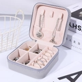 Portable light grey leather jewelry box with soft pink velvet interior for rings - Gray