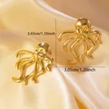 Macro shot of gold octopus earrings with a high-polished mirror finish and fine details - Stainless Steel Octopus Mirror