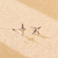 Minimalist S925 sterling silver four-pointed star stud earrings with a polished finish - Stud Earrings / White Gold