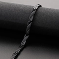 Matte black titanium steel bracelet featuring twisted links and dragon scale texture - Black