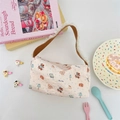 Detail of pink cartoon canvas tote bag with Bear Story print and white lace trim - Goodnight Bear