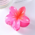 Detail of gradient pink plumeria hair claw clip with glossy resin finish on white surface - Rose Red 7cm