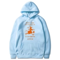 Detail of light blue Halloween hoodie with orange witch riding broom and funny quote print - Light Blue