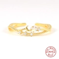 Close-up of S925 sterling silver moon and star ring with sparkling zircons and S925 stamp - Gold Moon Star